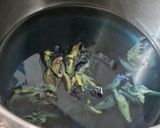 A picture of step 1 of Blue pea magic layered mocktail.