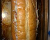 A picture of step 4 of Pizza baked stuffed French bread.