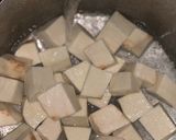 A picture of step 1 of White yam and tomato sauce.