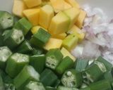 A picture of step 1 of Lady's finger and pumpkin stir fry.