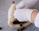 A picture of step 6 of Soft Chewy Braided Raisin Bread.