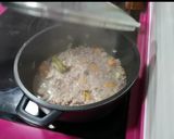 Foto del paso 4 de la receta: Pimientos tricolor rellenos de boloñesa al horno