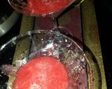 A picture of step 3 of Pinacolada and strawberries mocktail.
