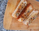 A picture of step 5 of Cheesy-sesame bread sticks.