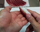 A picture of step 10 of Traditional Tuna Nigiri Sushi.