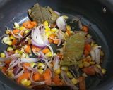 A picture of step 4 of Corn Handi Pulav.