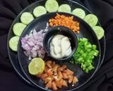 A picture of step 1 of Cheesy Cucumber bite.