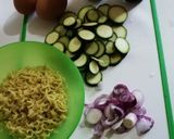A picture of step 1 of Zucchini noodles with egg# unique noodles recipe.