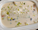 Foto del paso 4 de la receta: Gratinado de mejillones con puré de patatas y puerros