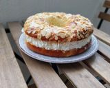 A picture of step 8 of Roscón de Reyes 2025 v2: With Almonds, Sugar, and Whipped Cream Filling.