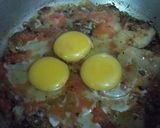 A picture of step 8 of Poached Eggs with spicy Tomatoes and Potato.
