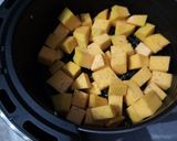 Foto del passaggio 4 della ricetta Zucca al rosmarino in friggitrice ad aria