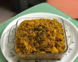 A picture of step 6 of Muri Ghonto: Bengali Yellow Rice with Fish Head.