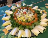 Une image de l'étape 8 de Salade de cresson aux jeunes endives, tomates cerises et persil.