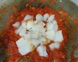 A picture of step 5 of Fideuá with Cuttlefish, Shrimp, and Aioli.