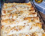 A picture of step 4 of Juicy, Cheesy, Delicious Chicken Enchiladas In Wheat Flour Tortillas.
