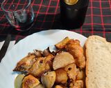 Foto del paso 8 de la receta Alitas al horno con patatas y cebolla