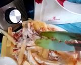 A picture of step 3 of Masala fries.
