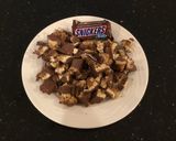 A picture of step 6 of Snickers Cookies.