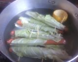 Foto del paso 4 de la receta: Panchos envueltos con hoja de repollo