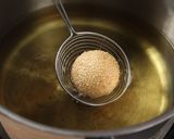 A picture of step 10 of Sesame ball with salted egg custard.