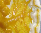 A picture of step 11 of Creamy mango sandwich.