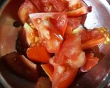A picture of step 2 of Peas Tomato Potato Curry.