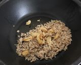 A picture of step 5 of Garlic fried rice with sliced grilled beef sirloin.
