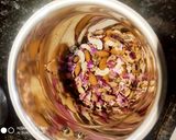 A picture of step 3 of Thandai.