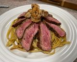 A picture of step 6 of Surf n’ Turf over Garlic Basil Fettuccine.