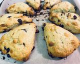 A picture of step 10 of SCONES with red berries & white chocolate chips!! 🍓🥛.