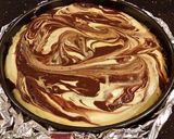 A picture of step 21 of Chocolate Salted Caramel Swirled Cheesecake.