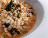 Foto del paso 11 de la receta: Arroz caldoso de sepia, rape, setas y espinacas