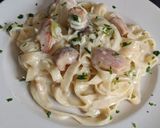 Foto del paso 9 de la receta: Pasta en salsa de pollo al verdeo