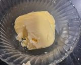 A picture of step 1 of 3 layered Cadbury and kiwi grapes Cheese cake 2 in 1.