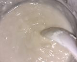 A picture of step 6 of Mini coconut doughnuts.