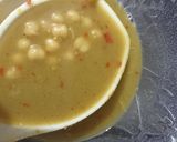 A picture of step 2 of Aloa ke smosa with red and Chana chutney.