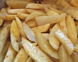 A picture of step 4 of Dry potatoe curry#cookingwith Tomatoescontest.