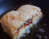 A picture of step 3 of Dulce de Leche Stuffed Torrijas.