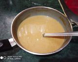 A picture of step 2 of Besan jaggery Sheera.