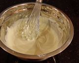 A picture of step 8 of Blueberry Strusel Muffins with a White Chocolaye Drizzle.
