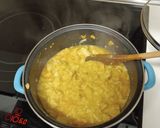 A picture of step 4 of Garlic Soup with Caramelized Onion, Leek, and Goat Cheese.
