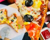 A picture of step 6 of Bread Pizza.
