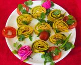 A picture of step 9 of Moong Dal Cheela Pinwheels.