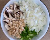 A picture of step 2 of Saucy Chicken & Rice.