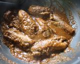 A picture of step 8 of Andhra Style Gutti Vankaya Pulusu Koora /Stuffed Brinjal Gravy Curry.