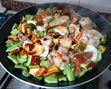 A picture of step 3 of Chicken and Pork Rib Paella.