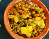 A picture of step 6 of Aloo chana kar sabji.