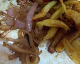 A picture of step 3 of Beef steak style burgers serve with Apple Mac salad and fries.