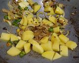 A picture of step 2 of Poi Saag and Potato Sabzi.